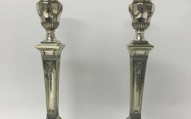 Pair of late Victorian silver plated candlesticks with neoclassical decoration by Hawksworh Eyre & Co.