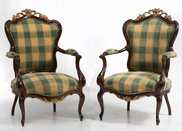 Pair of mahogany wooden armchairs with golden tufts