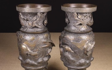 Paire de grands vases balustres en bronze japonais patiné brun foncé, moulés en trois sections,...