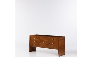 Paolo Buffa (1903-1970) Chest of drawers Walnut veneer, wood and brass Model created in the 1940s H