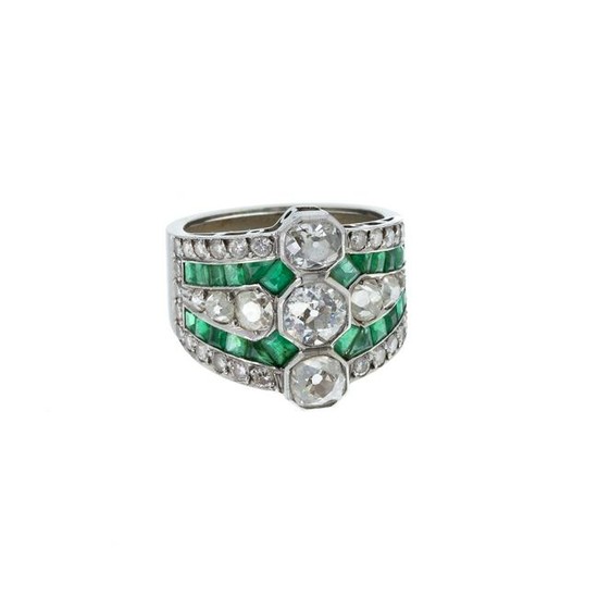 Platinum art deco ring with diamonds and emeralds