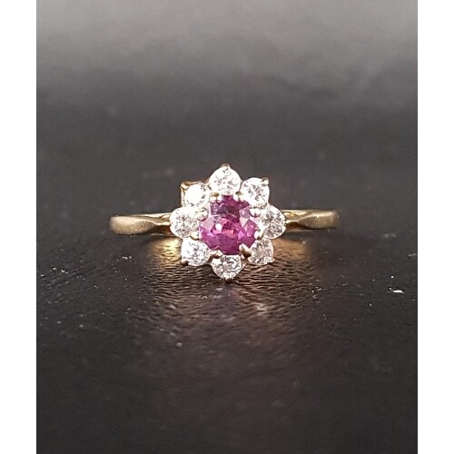 RUBY AND CZ CLUSTER RING the central ruby in eight CZ surrou...