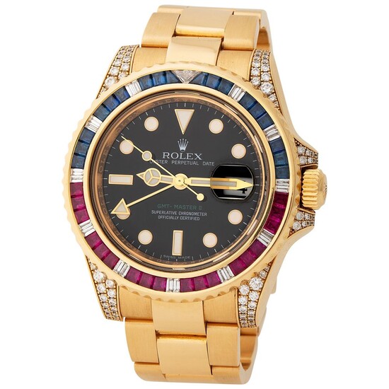 Rolex. Precious and Striking GMT-Master II SARU Automatic Wristwatch in Yellow Gold, Reference 116 758, With Diamond, Sapphire and Ruby-Set