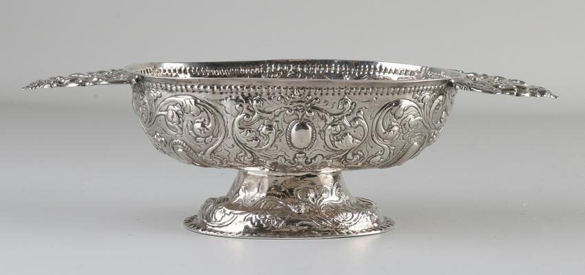 Silver Frisian brandy bowl with driven floral images on