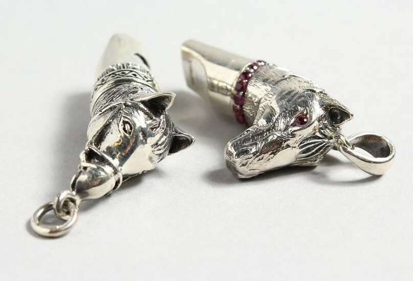 TWO CAST SILVER NOVELTY HORSE'S HEAD WHISTLES.