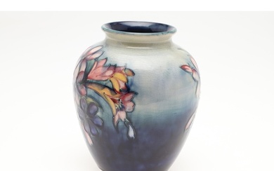 TWO EARLY MOORCROFT VASES. Including a William Moorcroft vas...