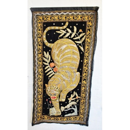 Three Thai wall hangings, each stumpwork decorated with a ti...