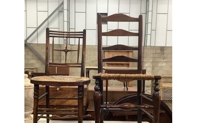 Two 19th century beech and fruitwood rush seat dining chairs...