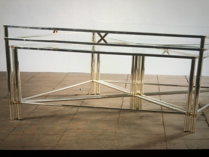 Unknown designer: Coffee table with with frame of chrome and brass. Top of glass. Including four triangular insertion tables. (5)