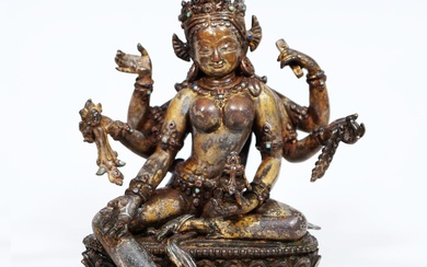 Vasudhara" (sanskrit "fleuve de pierres précieuses") assis sur le trône du lotus, Népal, ,bronze, patine...