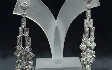 White gold earrings with diamonds Platinum. White gold, diamonds. Weight 11.25 g, length about 47 mm