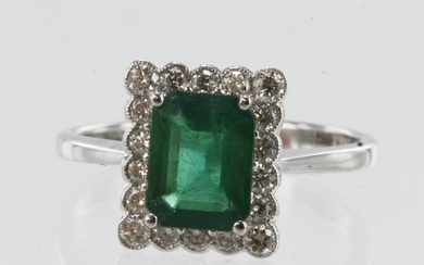 White gold (tests 18ct) diamond and emerald cluster ring, em...