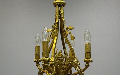 (-), bronzen 4-lichts hanglamp versierd met bladmoptieven, leeuwenkoppen...