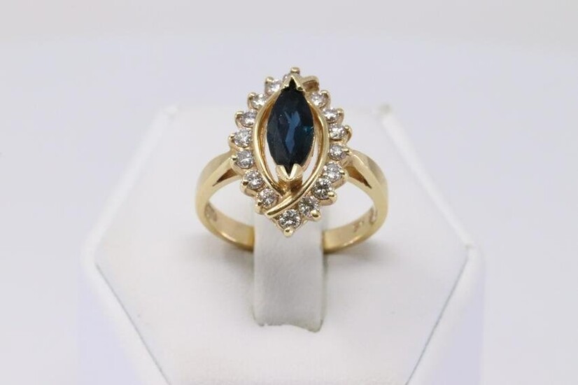 14Kt Yellow Gold Sapphire Diamond ring.