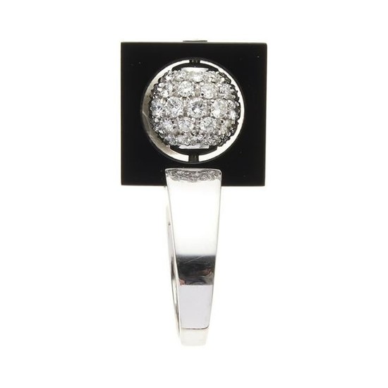 18kt white gold, onyx and diamond ring
