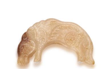 A PALE YELLOW-RUSSET ARCHAISTIC JADE PENDANT, HUANG, MING DYNASTY (1368-1644)