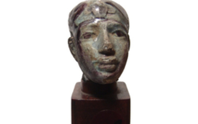 A lovely Egyptian glazed terracotta head of a pharaoh