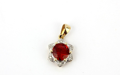 9CT GOLD, DIAMOND AND RED STONE PENDANT.