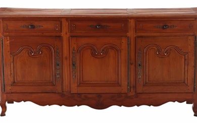 A 19TH CENTURY FRENCH PROVINCIAL STYLE CARVED WALNUT SIDEBOARD HAVING...