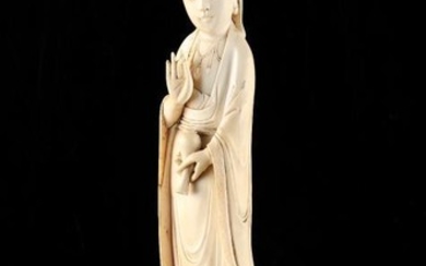A 19th century Chinese carved ivory figure of Guanyin,...