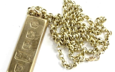 A 9ct gold ingot pendant and chain, the ingot...