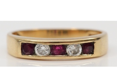 A 9ct gold ruby and brilliant cut diamond dress ring, O, 2.6...
