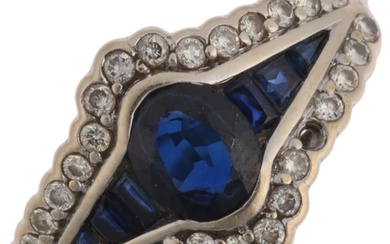 A 9ct white gold sapphire and diamond eye cluster ring, in t...