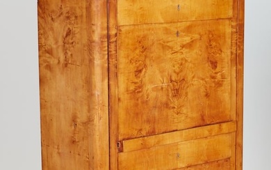 A Biedermeier birch armoire, early 19th century