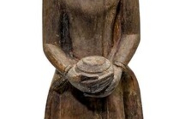 A CHARMING WOODEN FIGURE OF A STANDING MONK.