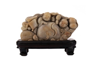 A CHINESE BOYS AND PEACH SOAPSTONE CARVING