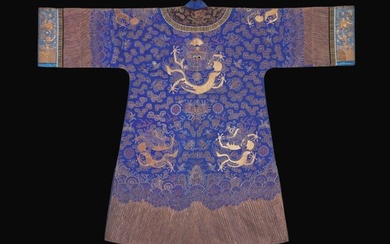 A Chinese embroidered blue silk "Dragon" surcoat, late Qing dynasty 刺繡藍地