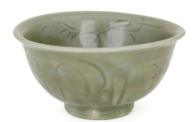 A Chinese grey stoneware Longquan celadon bowl, Ming dynasty, 15th century, incised with stylised floral motifs, red burnished firing ring to base, 15cm diameter