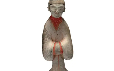 A Chinese pottery figure of a court lady Han dynasty, Modelled standing...
