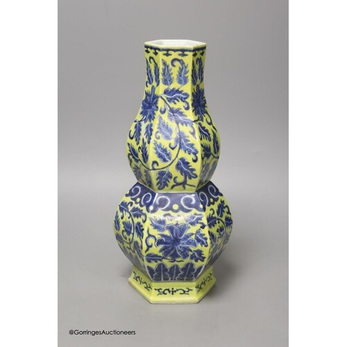 A Chinese underglaze blue yellow ground hexagonal vase, earl...