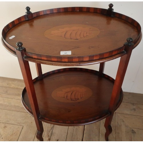 A Edwardian mahogany inlaid oval two tier occasional table (...
