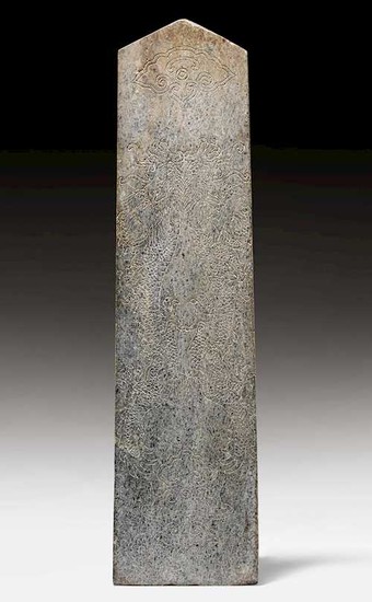 A GREEN SPECKLED STONE "GUI”-TABLET.