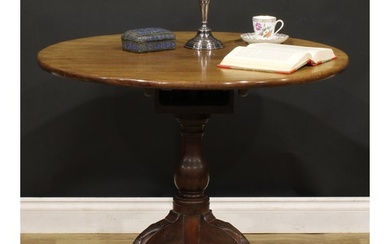 A George III mahogany tripod occasional table, circular tilt...