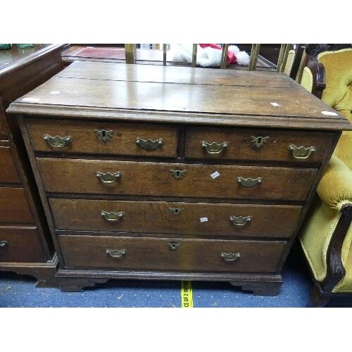 A Georgian oak Chest of Drawers, with two short drawers over...
