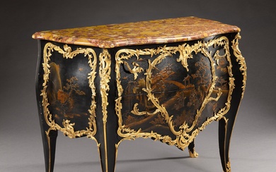A Louis XV style gilt-bronze mounted black lacquer commode by...