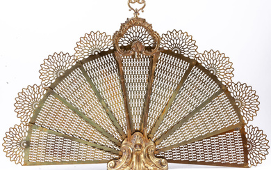 A Napoleon III gilt-bronze and brass fan-shaped fire-screen, mid....
