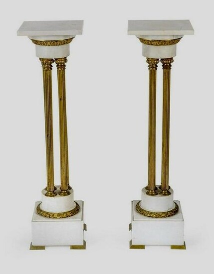 A PAIR OF DORE BRONZE AND MARBLE STANDS