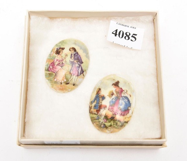 A PAIR OF FRENCH LIMOGES HAND PAINTED PORCELAIN PLAQUES, 4 CM TALL