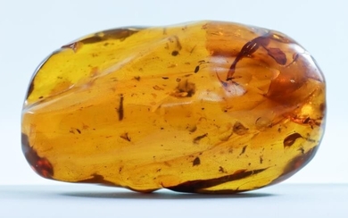 A Piece of Polished Amber, 5.25ins x 3ins x...