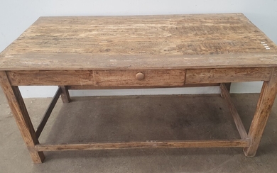 A RUSTIC PINE TABLE