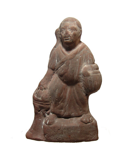 A Roman terracotta figure of Harpokrates