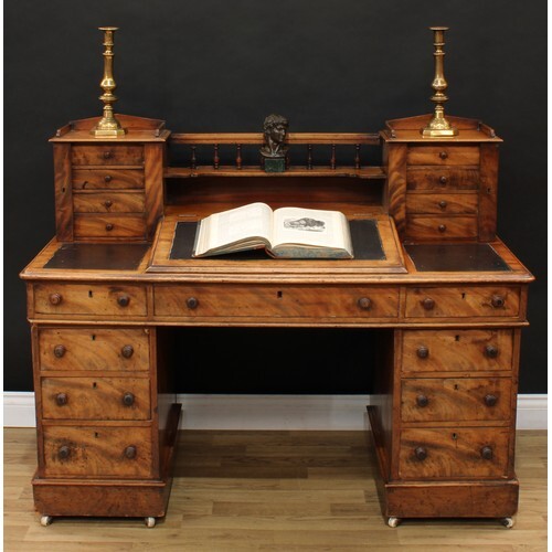 A Victorian walnut twin pedestal writing desk, the superstru...