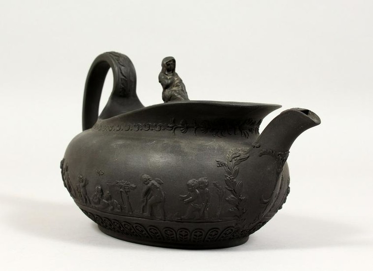 A WEDGWOOD BLACK BASALT OVAL TEAPOT AND COVER, with