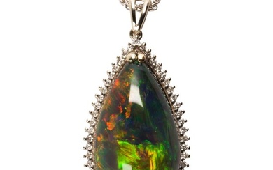 A black opal, diamond and white gold pendant and chain