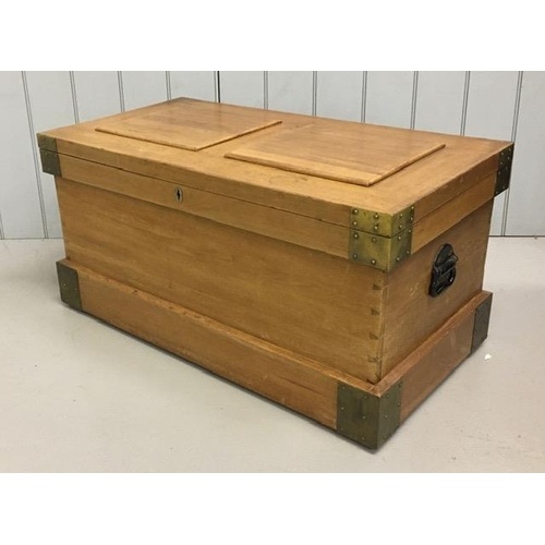 A brass mounted, camphor military campaign chest. Hinged lid...