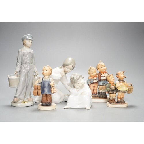 A collection of Lladro and Goebel ceramic figures etc., tall...